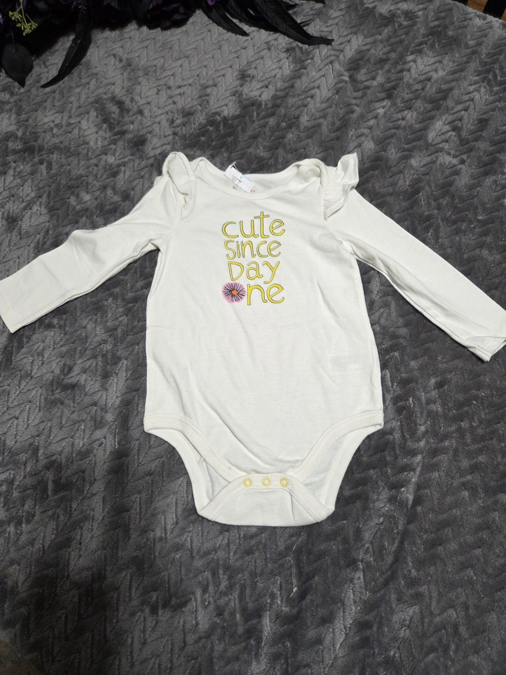 Cat & Jack Cream Long-Sleeve One-Piece with Yellow Text and Pink Flower